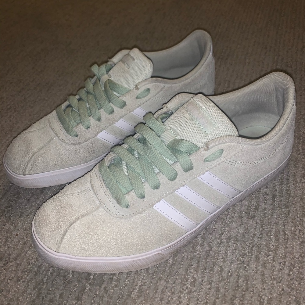 Adidas flat bottom light green sneakers
